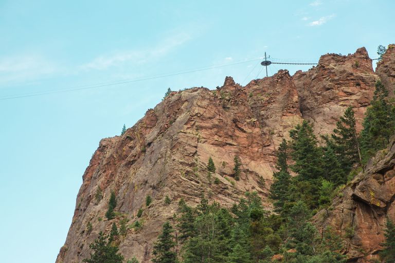 A Rocky Mountain With Trees